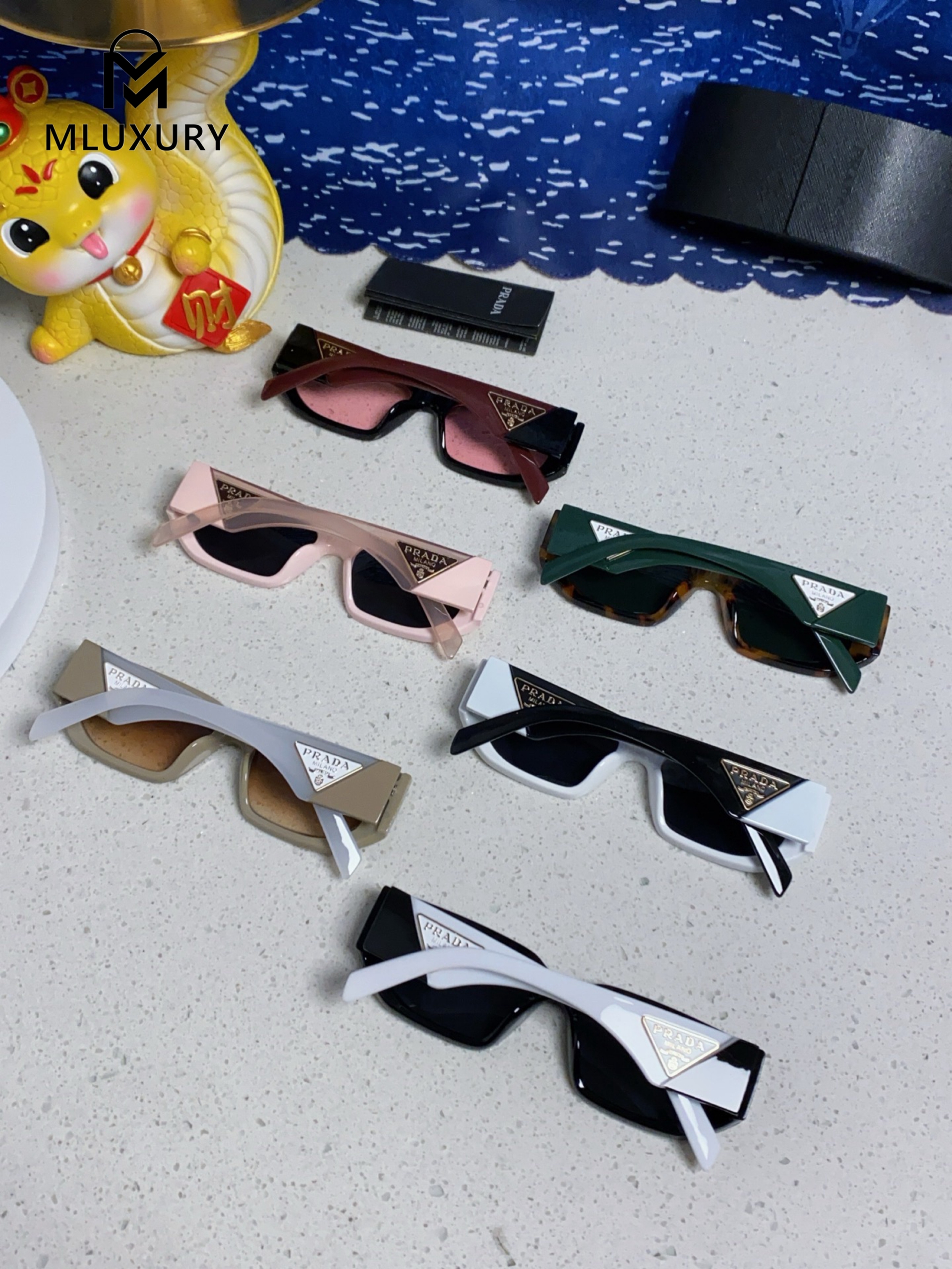 PRADA SUNGLASSES