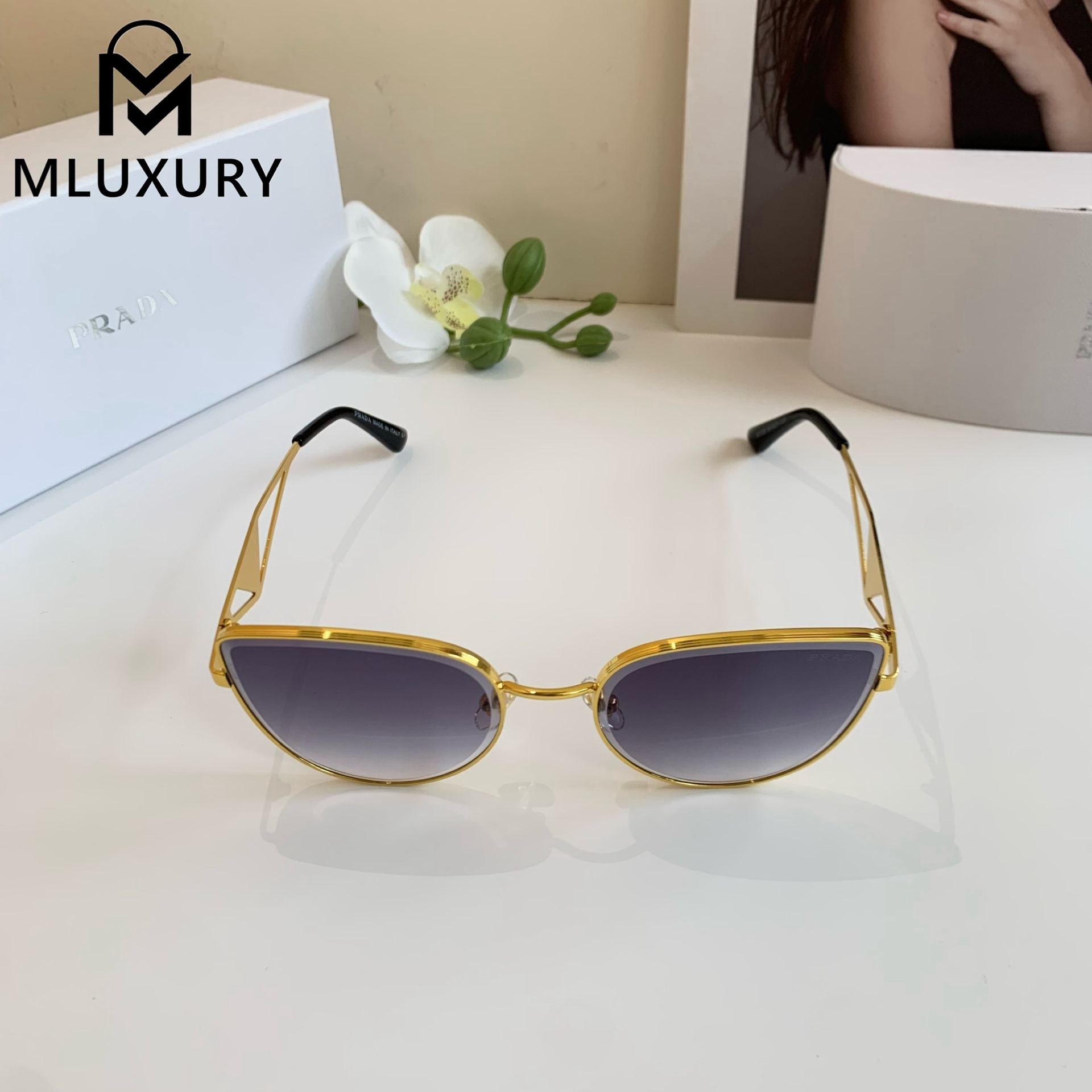 PRADA SUNGLASSES