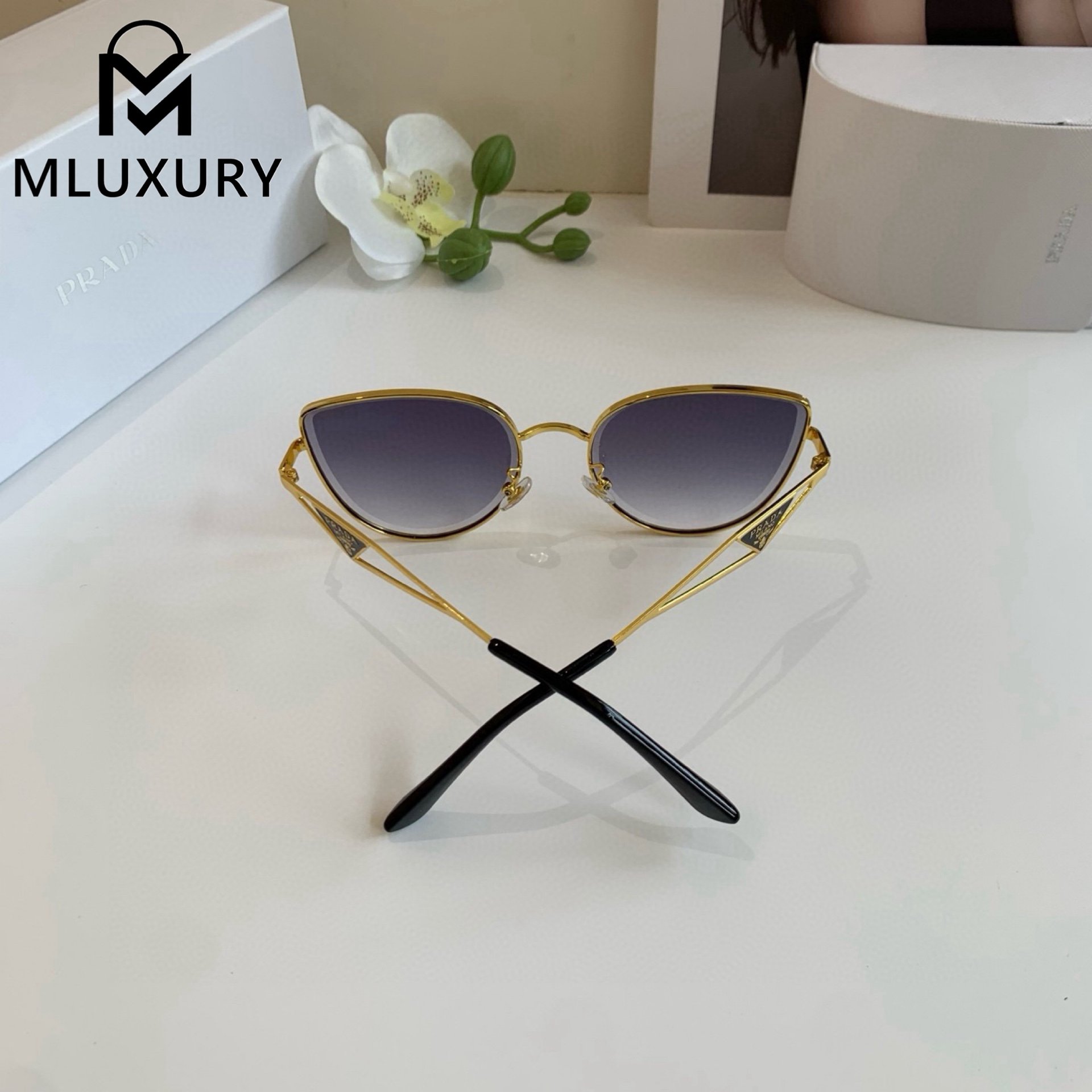 PRADA SUNGLASSES