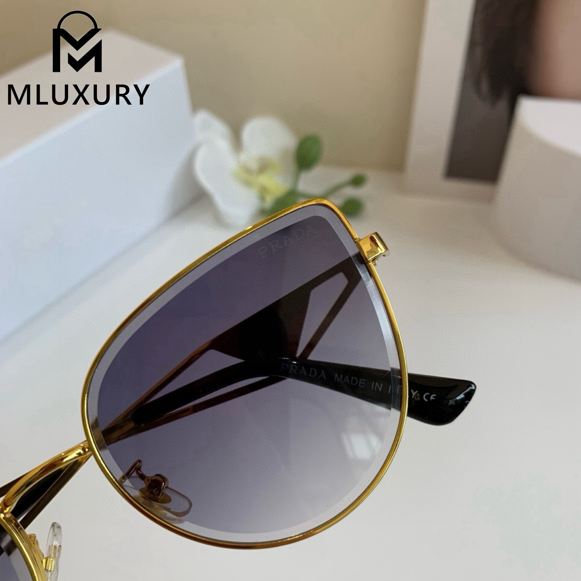 PRADA SUNGLASSES