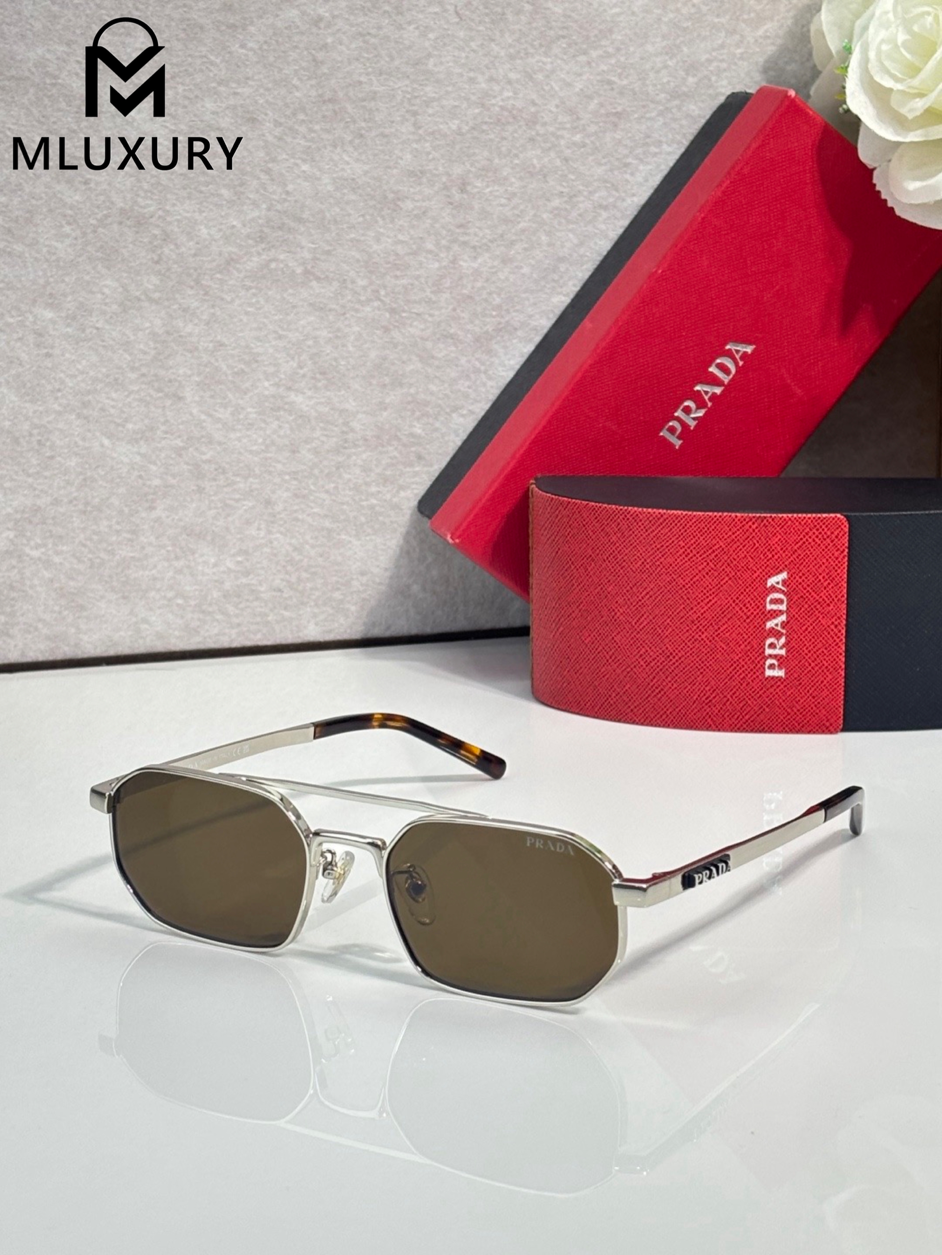 PRADA SUNGLASSES