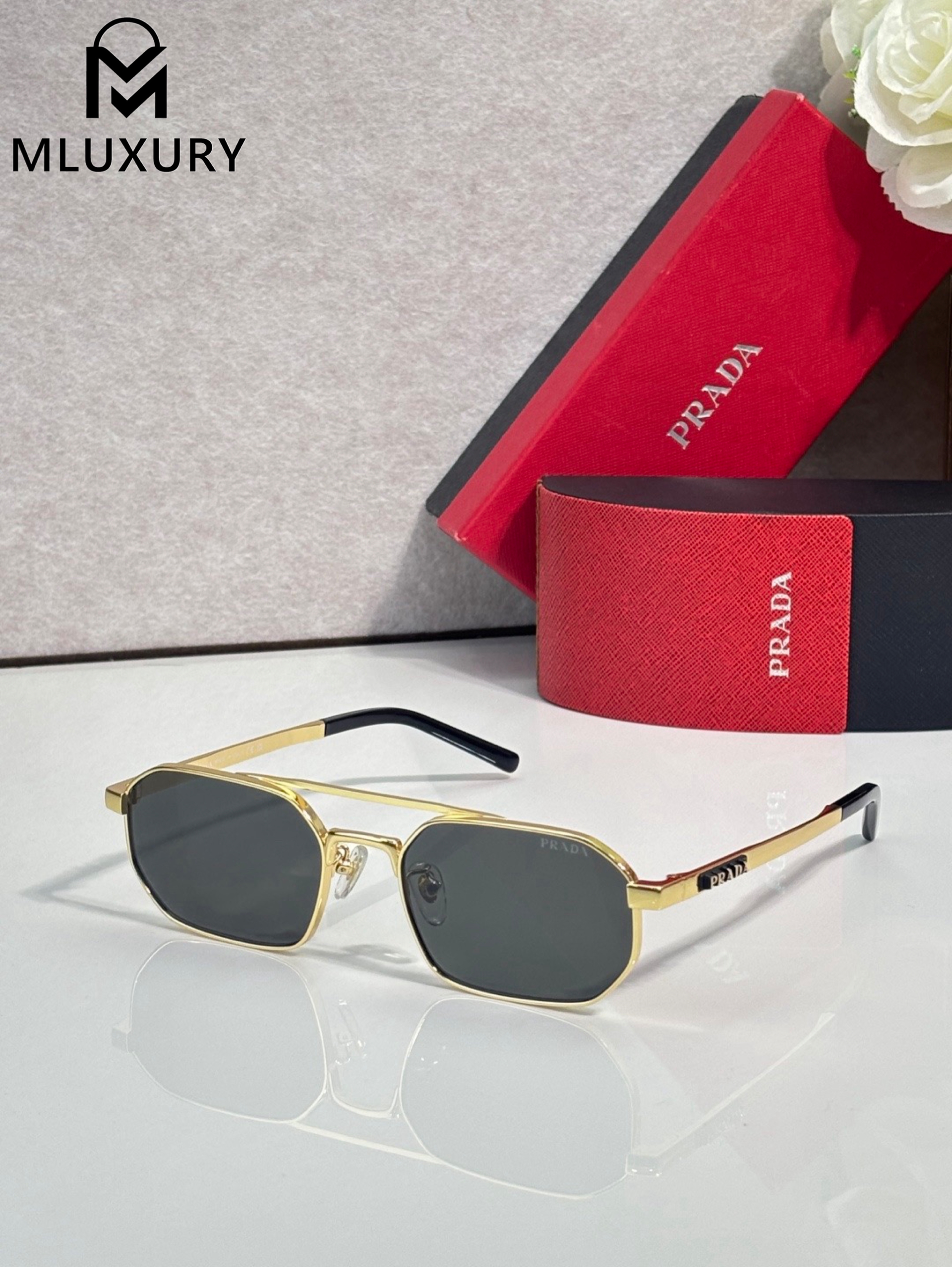 PRADA SUNGLASSES