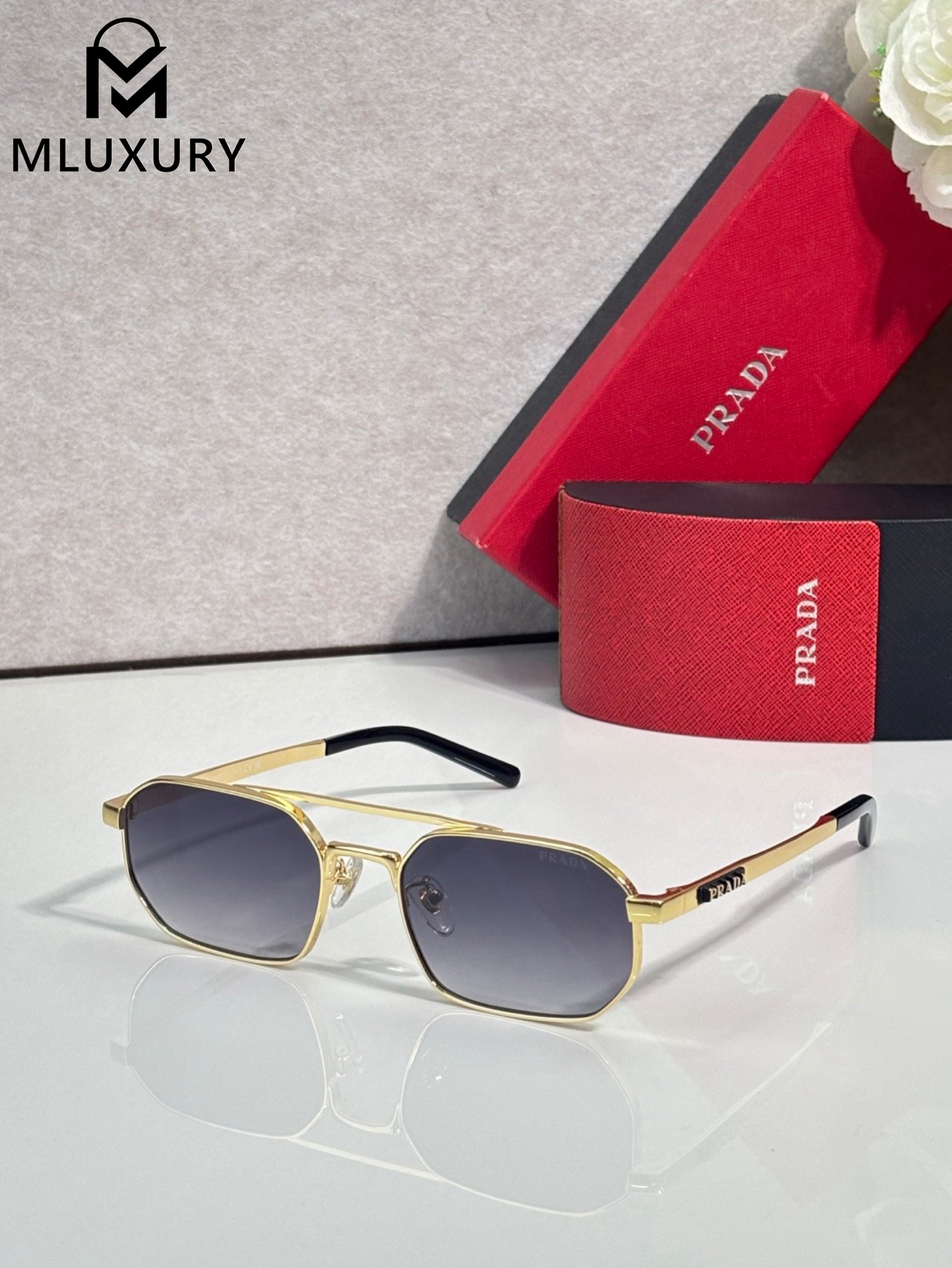 PRADA SUNGLASSES