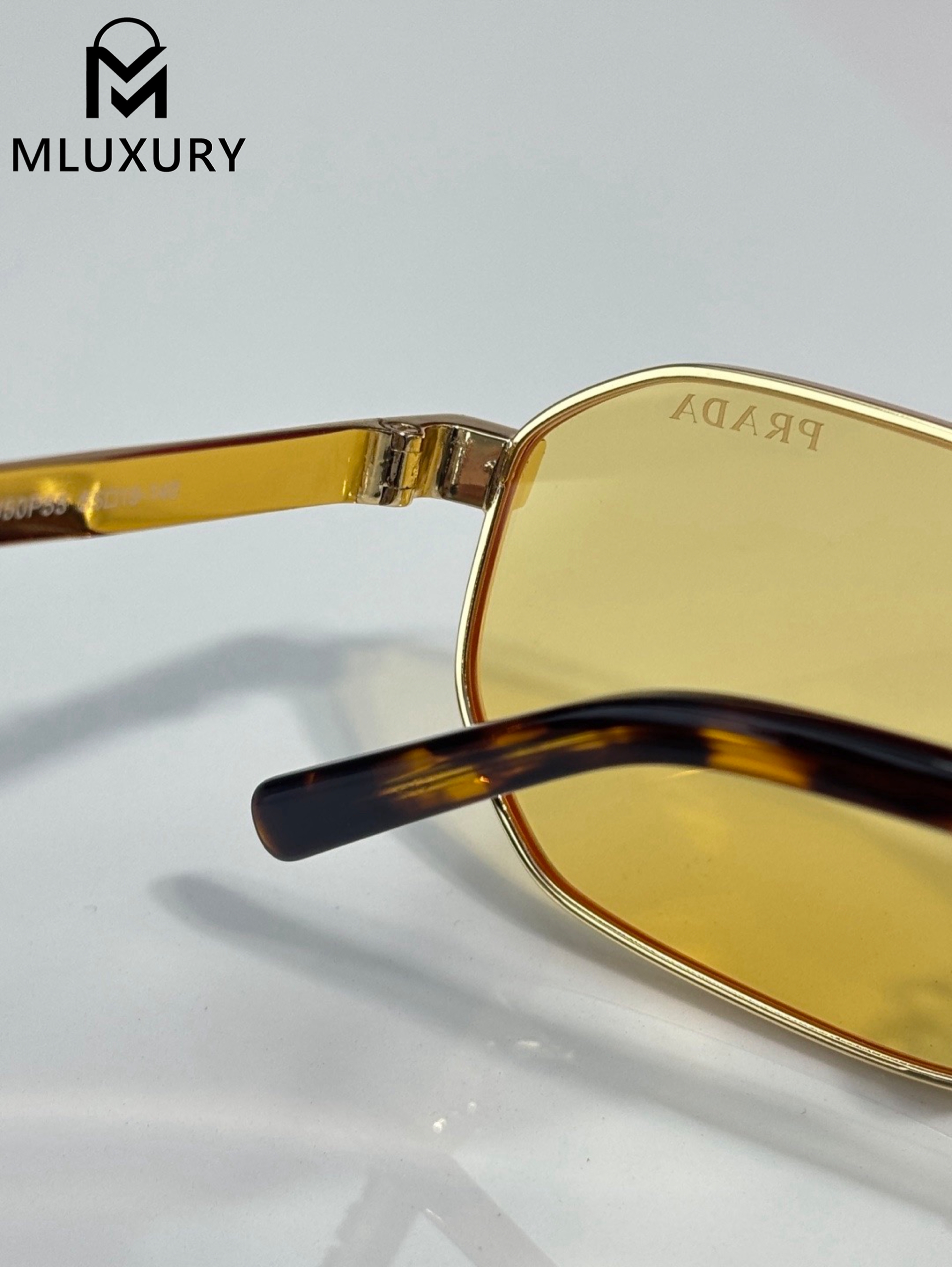 PRADA SUNGLASSES